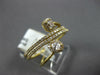 .50CT DIAMOND 18KT YELLOW GOLD ROUND BAGUETTE & OVAL MULTI ROW CRISS CROSS RING