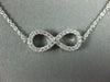 ESTATE .40CT DIAMOND 18KT WHITE GOLD 3D CLASSIC INFINITY LOVE NECKLACE