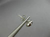 ESTATE 1.17CT DIAMOND & AAA GARNET 14KT WHITE GOLD ROUND HALO STUD EARRINGS