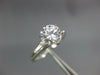 ESTATE 1.17CT DIAMOND PLATINUM 3D ROUND AND BAGUETTE 3 STONE ENGAGEMENT RING