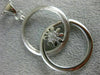 ESTATE LARGE .19CT DIAMOND 18K WHITE GOLD DOUBLE CIRCLE LOVE KNOT FLOWER PENDANT