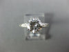 ESTATE 1.17CT DIAMOND PLATINUM 3D ROUND AND BAGUETTE 3 STONE ENGAGEMENT RING