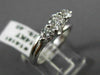 ESTATE .91CT DIAMOND 14KT WHITE GOLD 3D PAST PRESENT FUTURE TENSION RING #14161