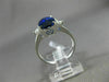 3.07CT TRILLION DIAMOND & OVAL SAPPHIRE 18KT WHITE GOLD 3 STONE ENGAGEMENT RING