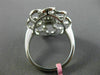 ESTATE LARGE .78CT ROUND & BAGUETTE DIAMOND 18KT WHITE GOLD FLOWER COCKTAIL RING