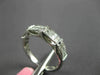 ESTATE .66CT DIAMOND 18KT WHITE GOLD ROUND & PRINCESS INVISIBLE ANNIVERSARY RING