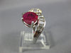 LARGE 3.65CT WHITE FANCY YELLOW DIAMOND & RUBY 18KT WHITE GOLD CRISS CROSS RING