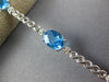 8.14CT DIAMOND & AAA BLUE TOPAZ 14KT WHITE GOLD 3D OVAL & ROUND TENNIS BRACELET