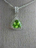 ESTATE .90CT DIAMOND & AAA PERIDOT 14K WHITE GOLD TRILLION HALO FLOATING PENDANT