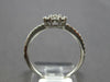 .56CT DIAMOND 18KT WHITE GOLD 3D ROUND & BAGUETTE CLUSTER SQUARE FRIENDSHIP RING