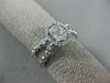 ESTATE .64CT DIAMOND 14KT WHITE GOLD CLUSTER OVAL CRISS CROSS X FRIENDSHIP RING