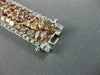 WIDE 22.84CT WHITE & PINK DIAMOND 18KT WHITE & ROSE GOLD CLUSTER TENNIS BRACELET