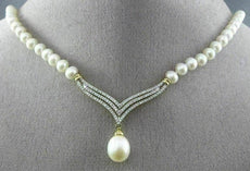 ESTATE .95CT DIAMOND & PEARL 14KT WHITE & YELLOW GOLD V SHAPE FLOATING NECKLACE