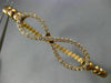 ESTATE .70CT DIAMOND 14KT ROSE GOLD 3D INFINITY FLEXIBLE LOVE BANGLE BRACELET