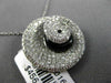 ESTATE LARGE 1.34CT DIAMOND & ONYX 18KT WHITE GOLD SWIRL SHELL FLOATING PENDANT