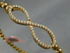 ESTATE .70CT DIAMOND 14KT ROSE GOLD 3D INFINITY FLEXIBLE LOVE BANGLE BRACELET