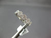 ESTATE .97CT DIAMOND 18K WHITE GOLD HALO SEMI ETERNITY INFINITY ANNIVERSARY RING
