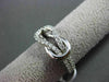ESTATE .33CT DIAMOND 14KT WHITE GOLD PAVE LOVE KNOT BELT COCKTAIL RING F/G VSSI