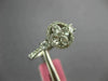 ESTATE .86CT DIAMOND 18KT WHITE GOLD 3D ROUND & PRINCESS FLOWER HALO LOVE RING