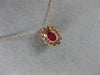 ESTATE .71CT DIAMOND & AAA OVAL CUT RUBY 14KT ROSE GOLD FLOWER FLOATING PENDANT