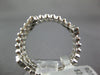 ESTATE .38CT DIAMOND 18KT WHITE GOLD FLOWER BEZEL BEADED ETERNITY STACKABLE RING