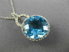 ESTATE LARGE 6.60CT DIAMOND & BLUE TOPAZ 14KT WHITE GOLD HALO ROUND HALO PENDANT