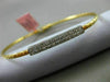 ESTATE .15CT DIAMOND 14KT TWO TONE GOLD ELONGATED PAVE FLEXIBLE BANGLE BRACELET
