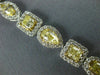 LARGE 11.36CT WHITE & FANCY YELLOW DIAMOND 18KT TWO TONE GOLD 3D TENNIS BRACELET
