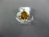 1.37CT DIAMOND & AAA CITRINE 14KT WHITE GOLD CUSHION & ROUND LOVE KNOT FUN RING
