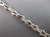.59CT DIAMOND 14KT WHITE GOLD 3D ROUND 3 STONE XO FILIGREE LOVE TENNIS BRACELET