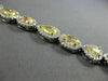 ESTATE 12.37CT WHITE & FANCY YELLOW DIAMOND 18K 2 TONE GOLD LOVE TENNIS BRACELET