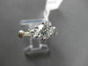ESTATE 1.12CT ROUND & BAGUETTE DIAMOND 14KT WHITE GOLD SOLITAIRE ENGAGEMENT RING
