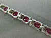 ESTATE WIDE 12.22CT DIAMOND & RUBY 18K WHITE GOLD CLASSIC OVAL TENNIS BRACELET