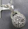 ESTATE .34CT DIAMOND 18KT WHITE GOLD 3D CLUSTER HALO CLASSIC LOVE KNOT PENDANT