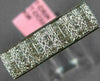 ESTATE .60CT DIAMOND 18KT WHITE GOLD ROUND & PRINCESS INVISIBLE ANNIVERSARY RING