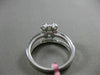 ESTATE 1.32CT ROUND & PRINCESS DIAMOND 18KT WHITE GOLD CLUSTER ENGAGEMENT RING