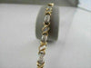 ESTATE WIDE 14KT TWO TONE 3.45CTW DIAMOND LOVE BRACELET