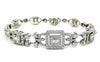 LARGE 4.2CT DIAMOND 18KT WHITE GOLD ROUND & BAGUETTE LOVE KNOT TENNIS BRACELET