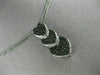 ESTATE .78CT WHITE & BLACK DIAMOND 14KT WHITE GOLD TRIPLE HEART JOURNEY PENDANT