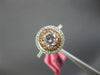 GIA 1.10CT WHITE & PINK DIAMOND 18KT WHITE & ROSE GOLD 3D HALO ENGAGEMENT RING
