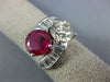 LARGE 3.65CT WHITE FANCY YELLOW DIAMOND & RUBY 18KT WHITE GOLD CRISS CROSS RING