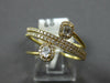 .50CT DIAMOND 18KT YELLOW GOLD ROUND BAGUETTE & OVAL MULTI ROW CRISS CROSS RING