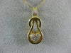 ESTATE .25CT DIAMOND 14KT YELLOW GOLD HEART LOVE KNOT INFINITY FLOATING PENDANT