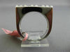 ESTATE .60CT ROUND & PRINCESS DIAMOND 18KT WHITE GOLD RECTANGULAR INVISIBLE RING