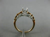 ESTATE .20CT DIAMOND 14KT WHITE & ROSE GOLD OPEN FILIGREE FLOWER ENGAGEMENT RING