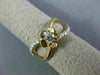 ESTATE .33CT DIAMOND 14KT YELLOW GOLD SOLITAIRE INFINITY FLOWER FRIENDSHIP RING