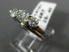 ESTATE .91CT DIAMOND 14KT WHITE GOLD 3D PAST PRESENT FUTURE TENSION RING #14161