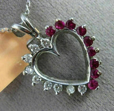 ESTATE .90CT DIAMOND & AAA RUBY 14KT WHITE GOLD OPEN HEART LOVE FLOATING PENDANT