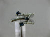 ESTATE WIDE .83CT DIAMOND & AAA SAPPHIRE 18K WHITE GOLD CRISS CROSS ETOILE RING