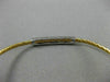 ESTATE .15CT DIAMOND 14KT TWO TONE GOLD ELONGATED PAVE FLEXIBLE BANGLE BRACELET